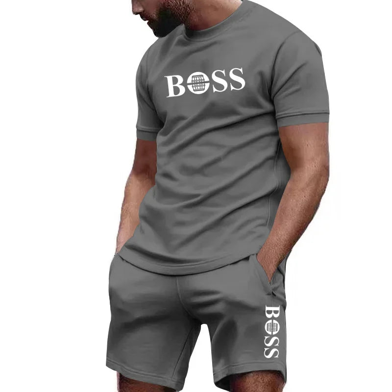 Completo sportivo da uomo a due pezzi con t-shirt a maniche corte e pantaloni, ideale per corsa e fitness, collezione estate 2026 con grandi sconti.