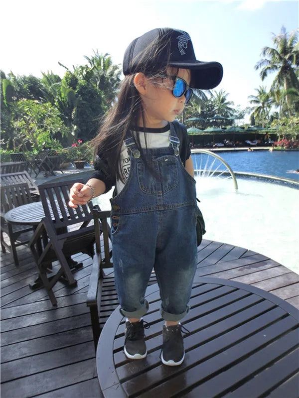 Nuovo arrivo primavera 2023 Salopette in denim per bambine e bambini con bottoni Salopette blu tinta unita per bambini 1-8 anni