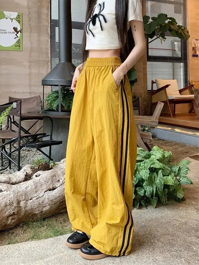 Pantaloni sportivi stile americano ad asciugatura rapida, estivi, nuovi, larghi, a righe, sottili, traspiranti, casual, a gamba larga, pantaloni lunghi da donna