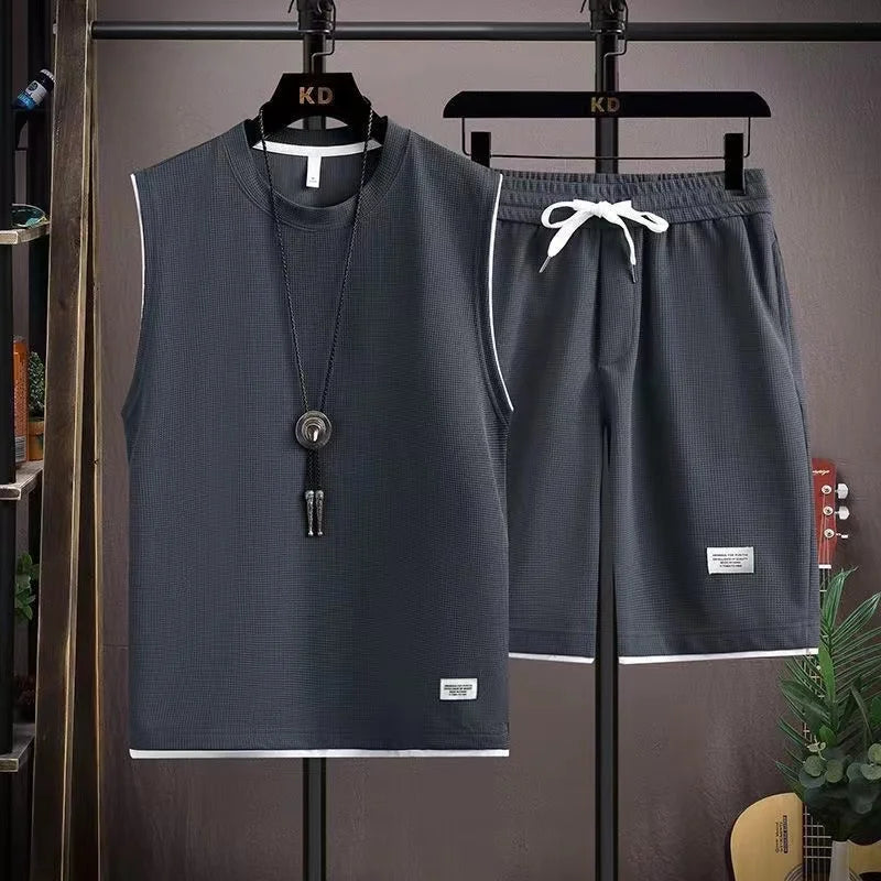 Completo estivo 2024 da uomo, ampio, a maniche corte, casual, con canotta e pantaloncini sportivi, traspirante, ideale per la strada e la gioventù.