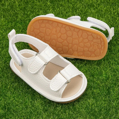 Sandali estivi per neonati Meckior, scarpe per bambini in pelle PU con suola in gomma antiscivolo, primi passi per neonati e bambine da 0 a 18 mesi.