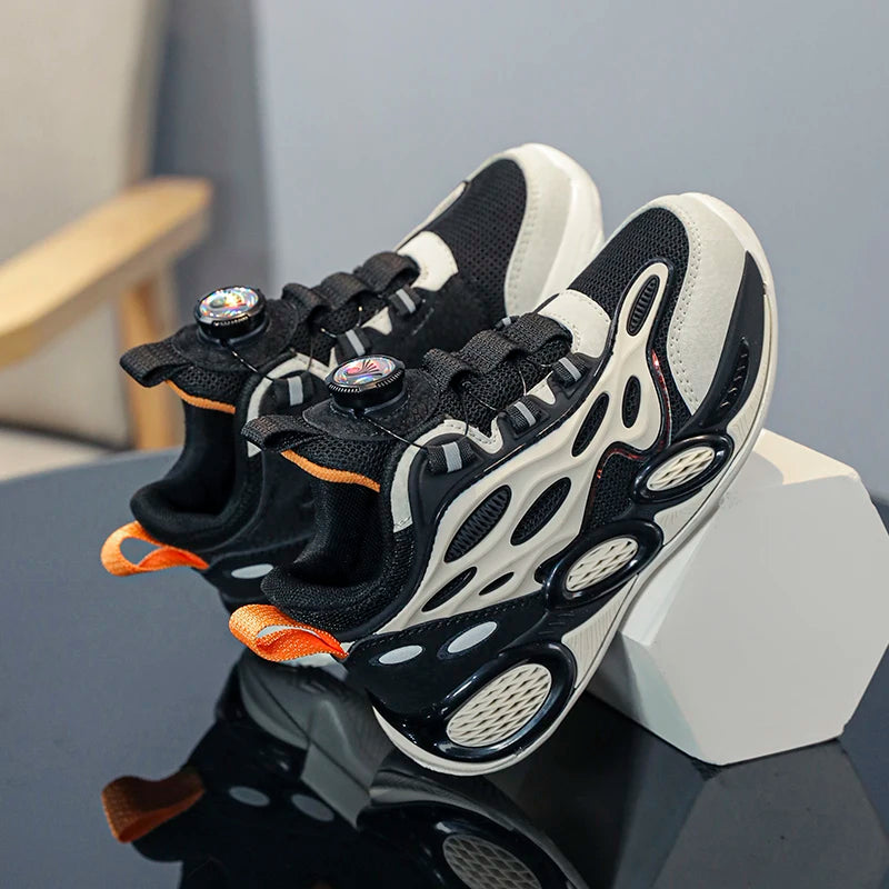 Scarpe da bambino 2024 Nuove scarpe sportive casual per bambini primavera e autunno con chiusura a bottone rotante e rete traspirante