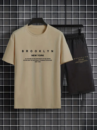Completo estivo da uomo con pantaloncini a maniche corte, t-shirt di tendenza con stampa girocollo, completo da uomo con completo sportivo a due pezzi da gangster affascinante