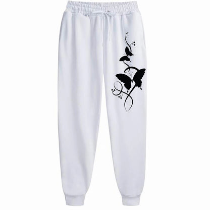 Pantaloni da donna casual e versatili con stampa, pantaloni hip hop alla moda con coulisse e tasche, pantaloni della tuta