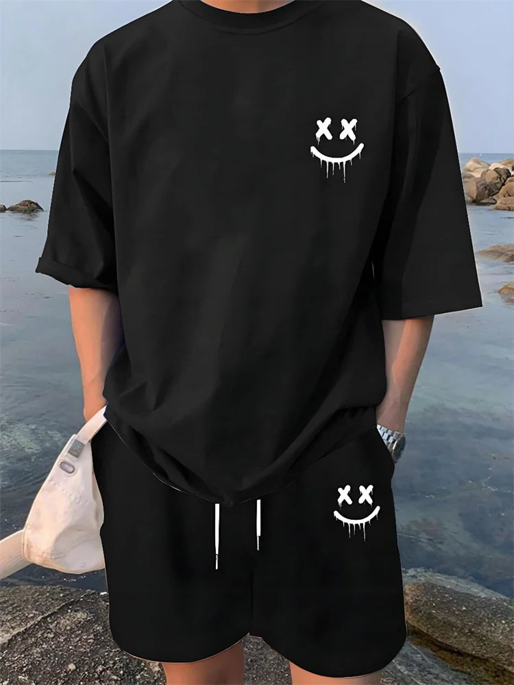 Completo estivo casual da uomo con pantaloncini a maniche corte, maglietta alla moda da uomo stile urbano, pantaloncini sportivi da uomo per attività all'aperto.