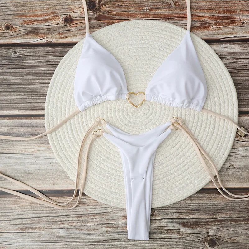 Costume da bagno bikini brasiliano sexy da donna, composto da top a triangolo con allacciatura al collo e slip a perizoma, due pezzi con motivo a cuore, ideale per l'estate e la spiaggia.