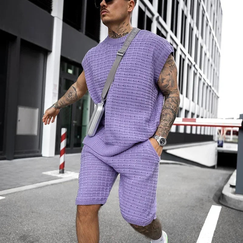Nuovi completi casual da uomo 2026 a due pezzi per l'estate, con maglietta senza maniche tinta unita e pantaloncini, set da tuta streetwear da uomo.