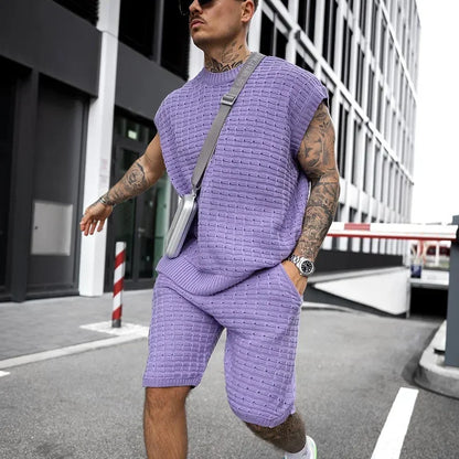 Nuovi completi casual da uomo 2026 a due pezzi per l'estate, con maglietta senza maniche tinta unita e pantaloncini, set da tuta streetwear da uomo.