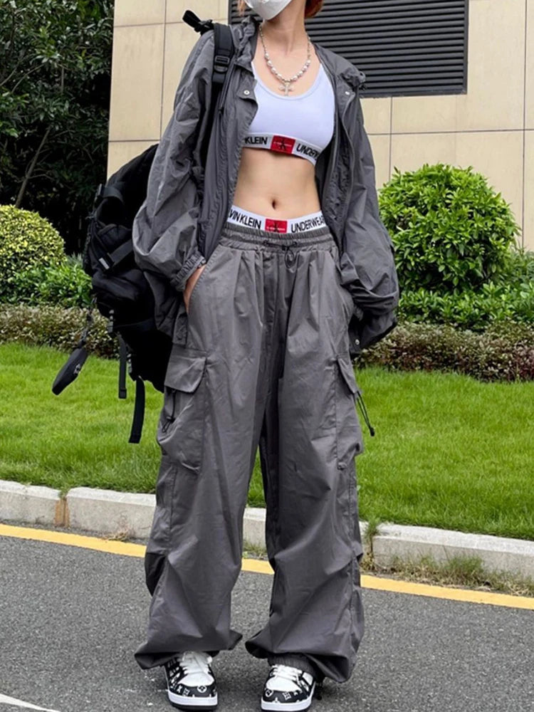 Pantaloni neri da donna stile Y2K Parachute, stile hippie streetwear, con tasche oversize, pantaloni cargo, gamba larga, stile Harajuku.