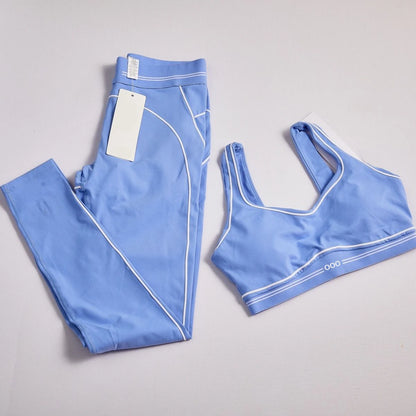 Set da due pezzi sportivo e fitness comodo da donna, canotta estiva e pantaloni aderenti 2026