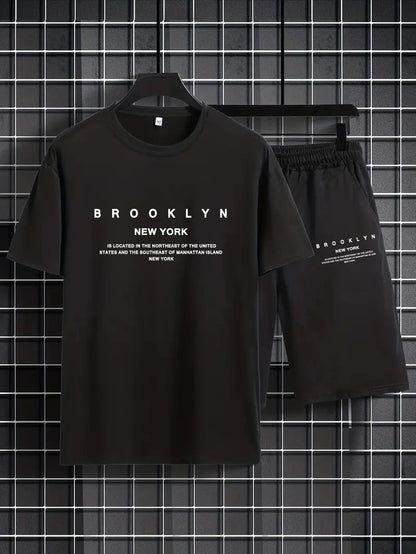 Completo estivo da uomo con pantaloncini a maniche corte, t-shirt di tendenza con stampa girocollo, completo da uomo con completo sportivo a due pezzi da gangster affascinante