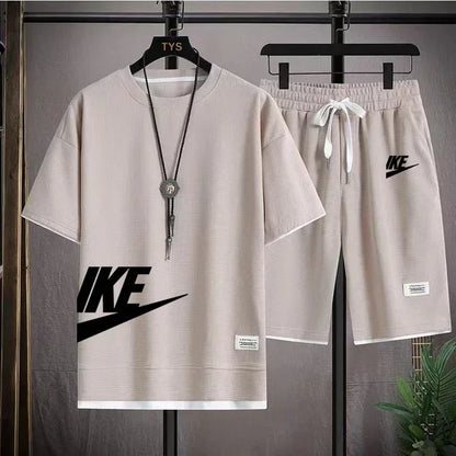 Nuovo completo sportivo estivo da uomo composto da t-shirt a maniche corte e pantaloncini, completo da jogging traspirante a due pezzi per attività all'aperto.