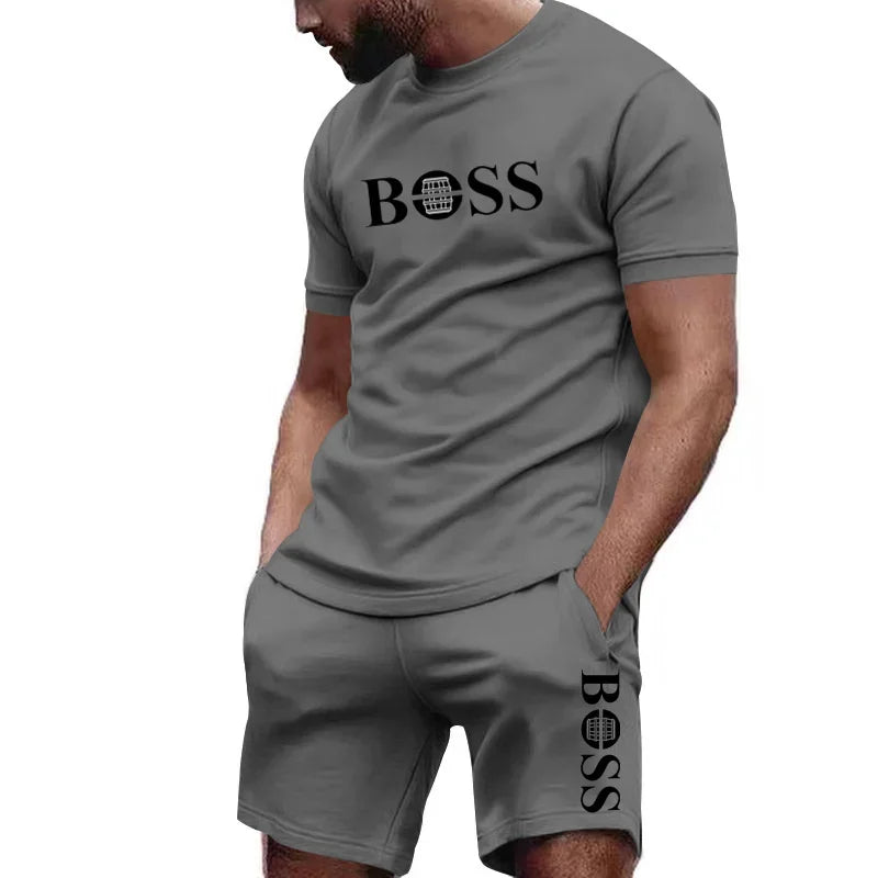 Completo sportivo da uomo a due pezzi con t-shirt a maniche corte e pantaloni, ideale per corsa e fitness, collezione estate 2026 con grandi sconti.