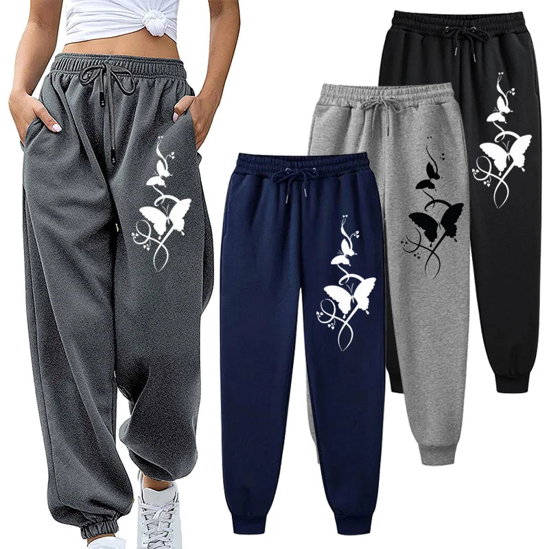Pantaloni da donna casual e versatili con stampa, pantaloni hip hop alla moda con coulisse e tasche, pantaloni della tuta