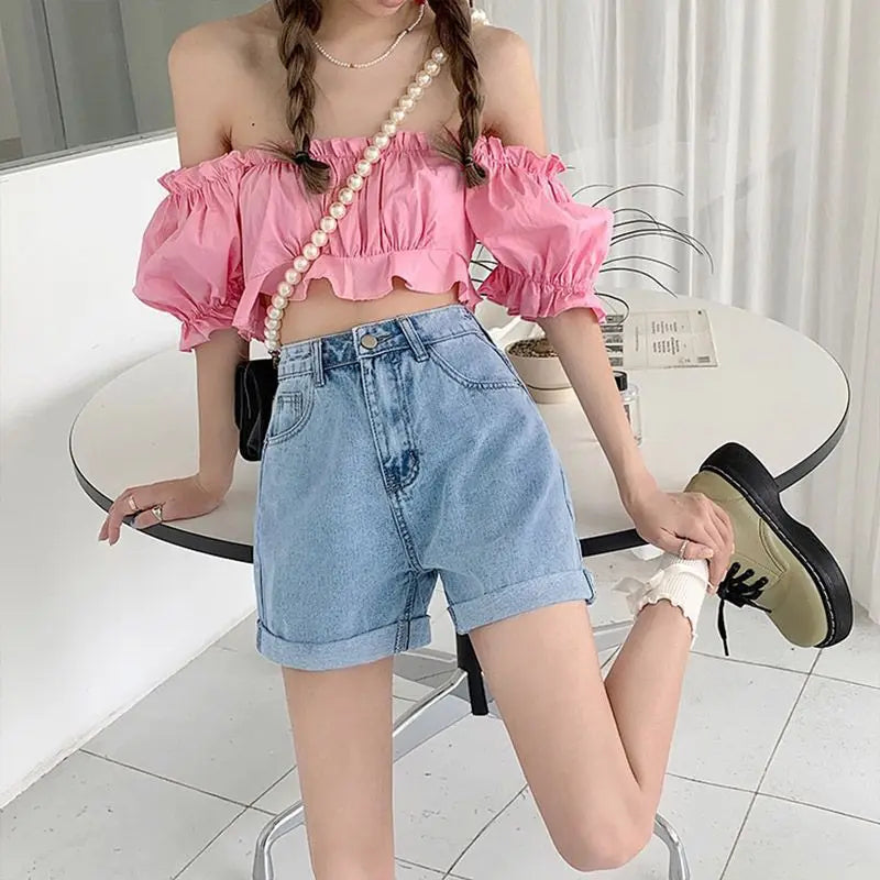 Pantaloncini da donna in denim a vita alta, gamba larga e linea ad A, colore azzurro chiaro, con risvolto, stile coreano, modello hot pants, design di tendenza, pantaloncini casual in cotone.