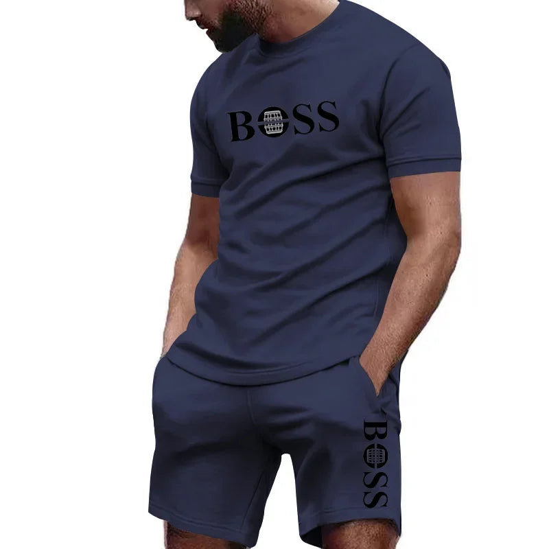 Completo sportivo da uomo a due pezzi con t-shirt a maniche corte e pantaloni, ideale per corsa e fitness, collezione estate 2026 con grandi sconti.