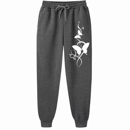 Pantaloni da donna casual e versatili con stampa, pantaloni hip hop alla moda con coulisse e tasche, pantaloni della tuta