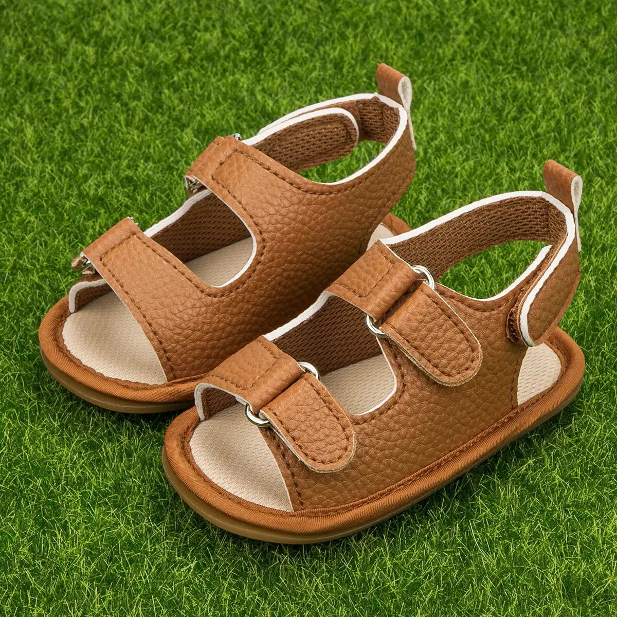 Sandali estivi per neonati Meckior, scarpe per bambini in pelle PU con suola in gomma antiscivolo, primi passi per neonati e bambine da 0 a 18 mesi.
