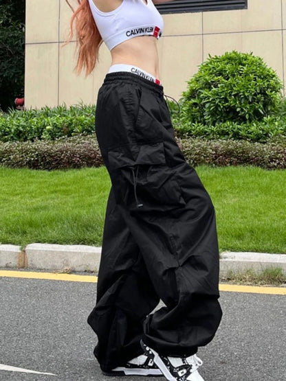 Pantaloni neri da donna stile Y2K Parachute, stile hippie streetwear, con tasche oversize, pantaloni cargo, gamba larga, stile Harajuku.