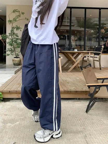 Pantaloni sportivi stile americano ad asciugatura rapida, estivi, nuovi, larghi, a righe, sottili, traspiranti, casual, a gamba larga, pantaloni lunghi da donna