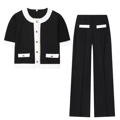 Completo composto da giacca a maniche corte con scollo rotondo in pelle perlata a contrasto, elastico in vita e pantaloni a vita alta