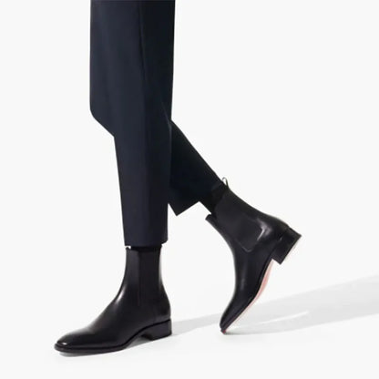 Stivali Chelsea da uomo con suola rossa, scarpe eleganti nere da uomo con punta a punta, stivali corti da uomo alla moda in Inghilterra.