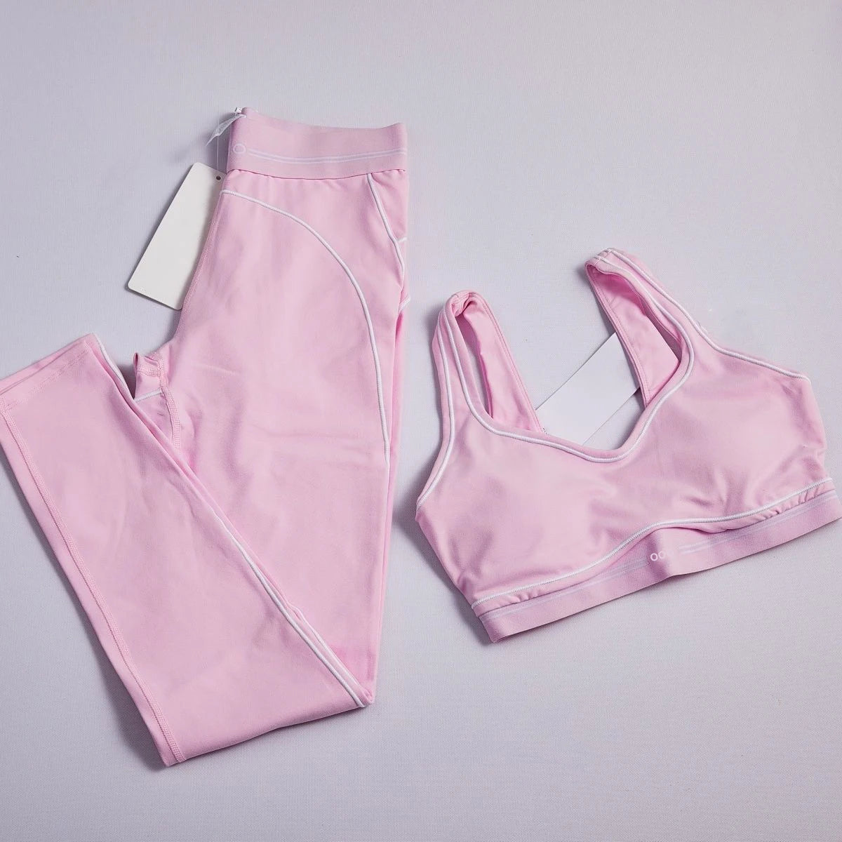 Set da due pezzi sportivo e fitness comodo da donna, canotta estiva e pantaloni aderenti 2026