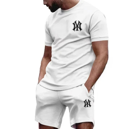 Completo sportivo da uomo a due pezzi 2026, composto da t-shirt a maniche corte e abbigliamento sportivo estivo per corsa e fitness.
