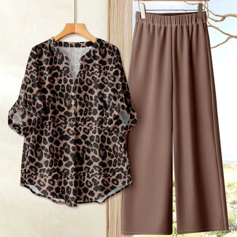 Completo casual da donna autunno 2025, top ampio a maniche lunghe stampato alla moda abbinato a pantaloni larghi in tinta unita, set da due pezzi