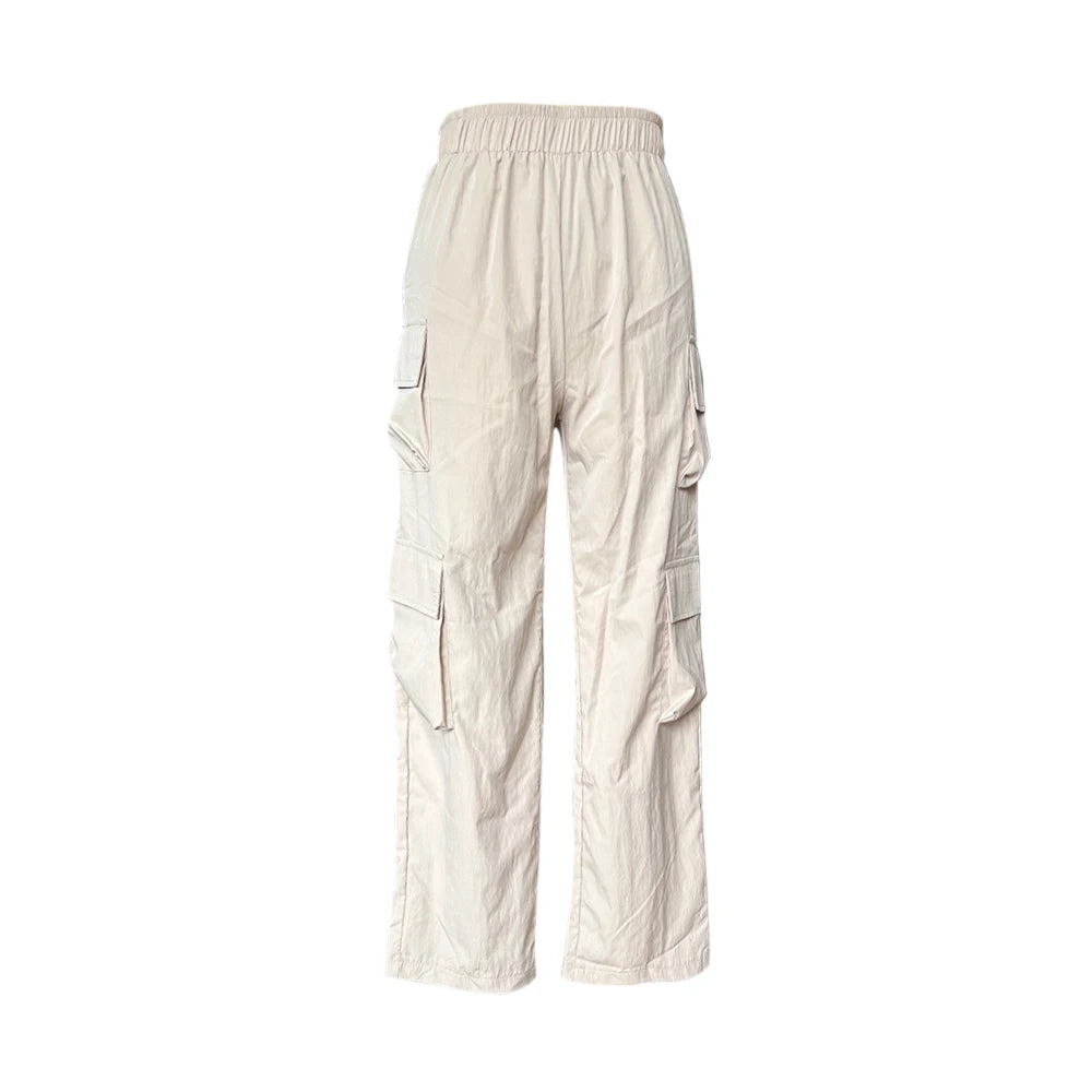 Pantaloni da lavoro da donna a tinta unita con tasche, vita alta e elastico in vita.