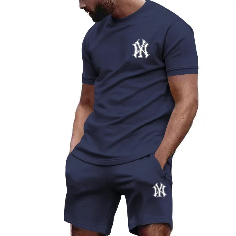 Completo sportivo da uomo a due pezzi 2026, composto da t-shirt a maniche corte e abbigliamento sportivo estivo per corsa e fitness.