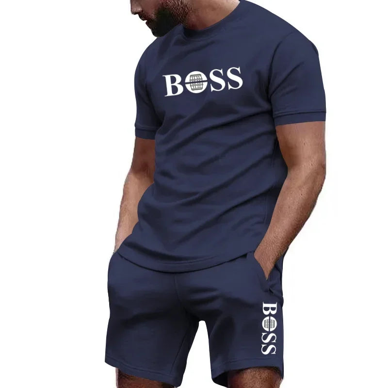 Completo sportivo da uomo a due pezzi con t-shirt a maniche corte e pantaloni, ideale per corsa e fitness, collezione estate 2026 con grandi sconti.