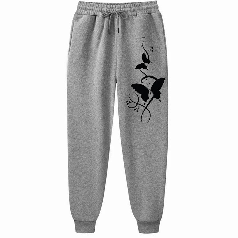 Pantaloni da donna casual e versatili con stampa, pantaloni hip hop alla moda con coulisse e tasche, pantaloni della tuta