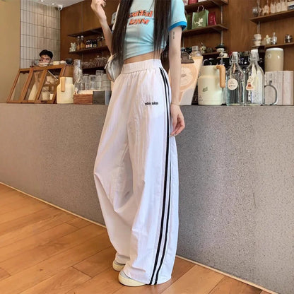 Pantaloni sportivi stile americano ad asciugatura rapida, estivi, nuovi, larghi, a righe, sottili, traspiranti, casual, a gamba larga, pantaloni lunghi da donna