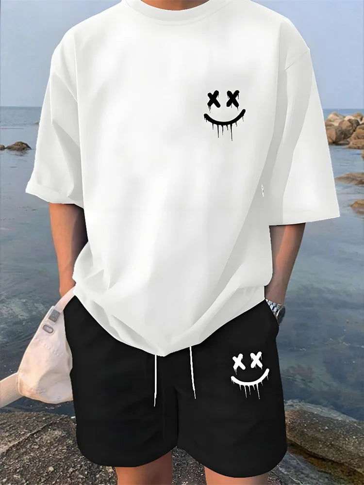 Completo estivo casual da uomo composto da 2 pezzi: pantaloncini a maniche corte con stampa hawaiana, t-shirt da uomo e pantaloncini da spiaggia per sport all'aria aperta.