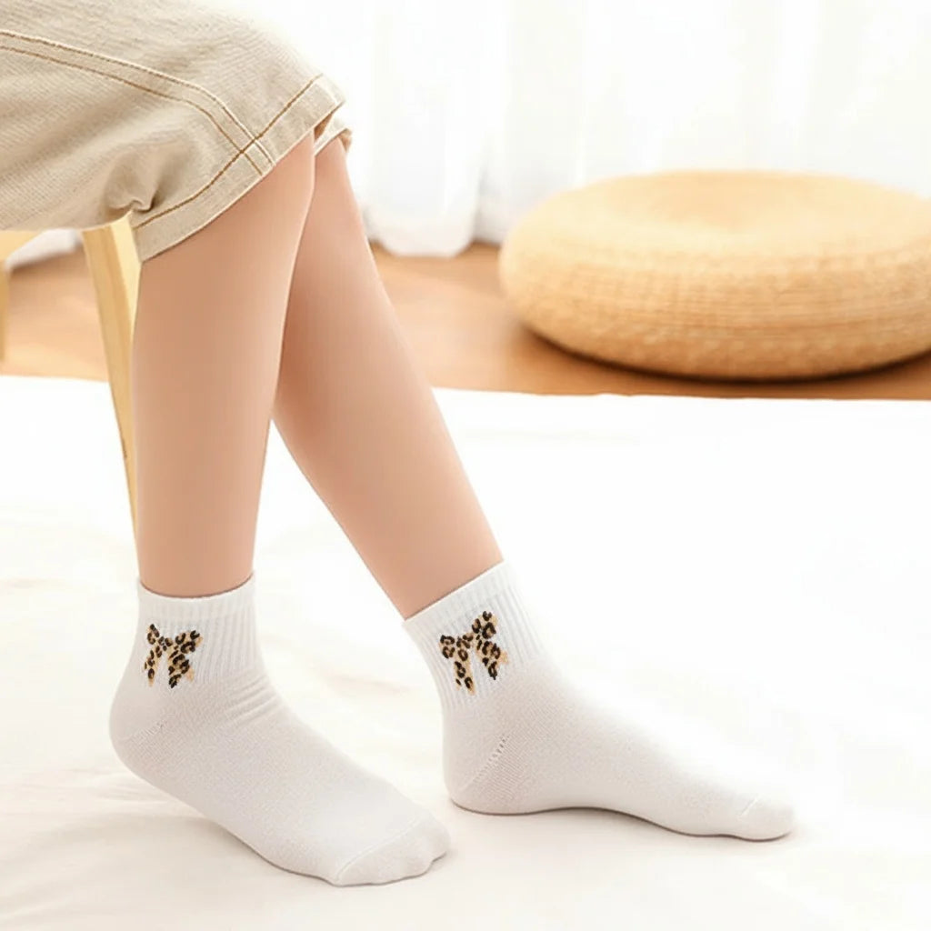 10 paia di adorabili calzini per bambini in bianco e nero, con stampa leopardata alla moda e fiocchi, comodi calzini per bambini a metà polpaccio